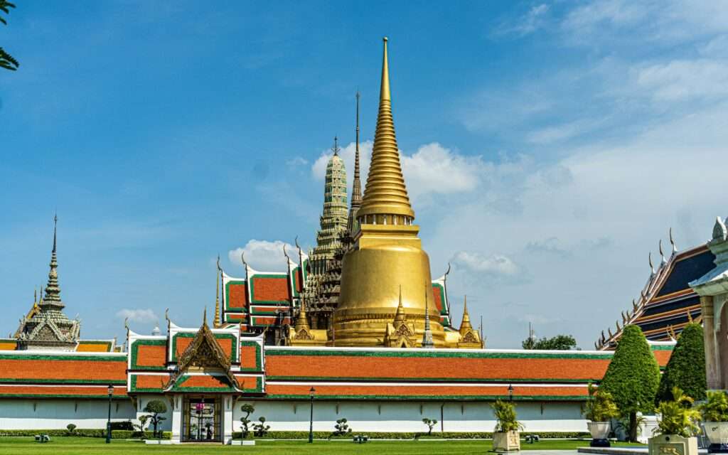 Golden chedi and rooftops of Wat Phra Kaew at the Grand Palace, Bangkok