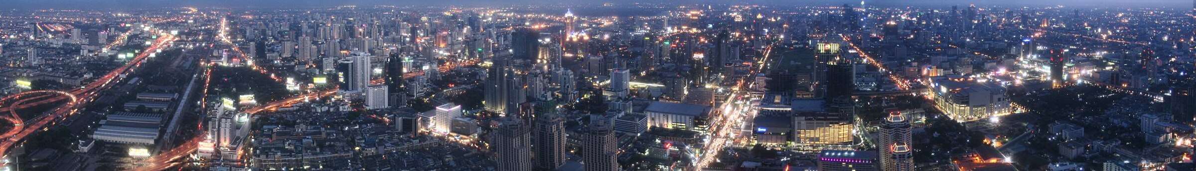 Bangkok lit up at night, seen from above